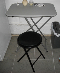 Folding table and stool. Great for tight spots or hide them away.